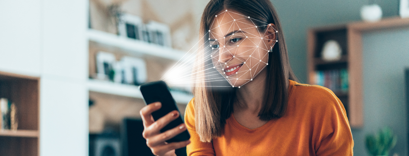 A woman looking at her phone getting her identity verified