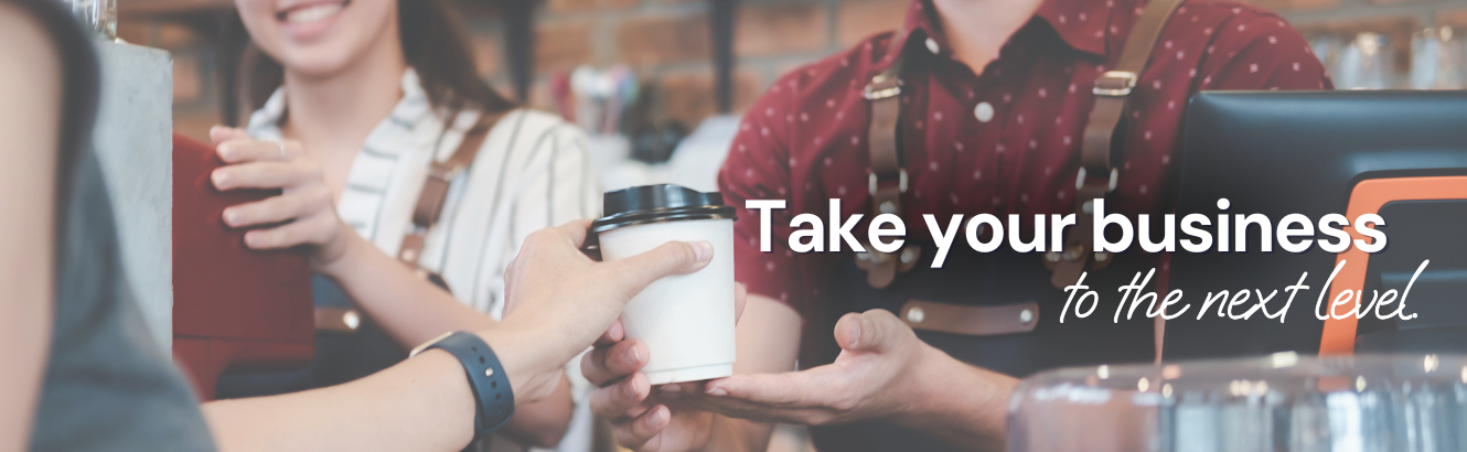 Image of a coffee shop with a headline of, "Take your business to the next level."